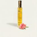 bottle with Body & Face moisturizing blend of precious oils with vitamin E & Rose