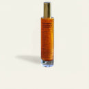 Glass bottle with Shimmering sunscreen oil with vitamin E & mica – SPF 25