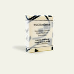 Soap bar with 'theOliveSense' branding on a light background