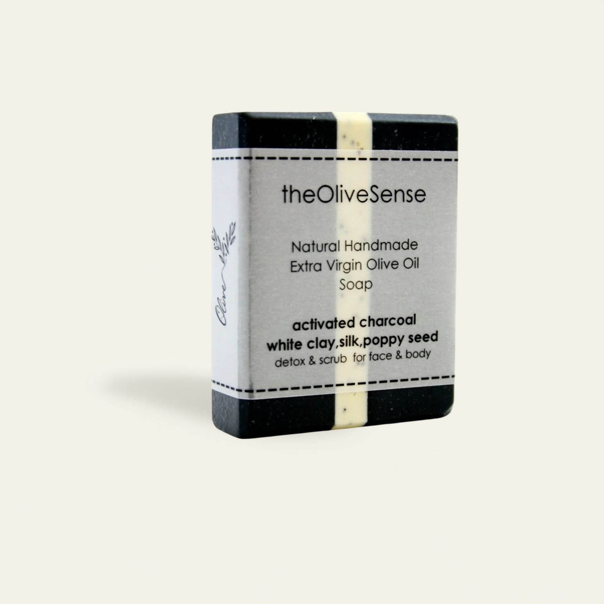 Bar of soap with 'theOliveSense' branding on a white background