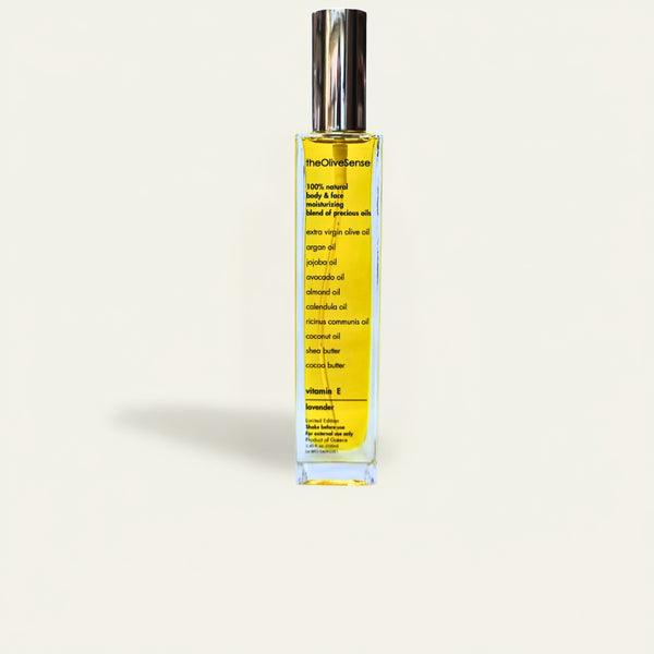 Bottle of The Olive Sense body and face oil with vitamin E and lavender notes. 