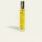 Bottle ofThe Olive Sense body and face oil with vitamin E and fresh mastiha scent.