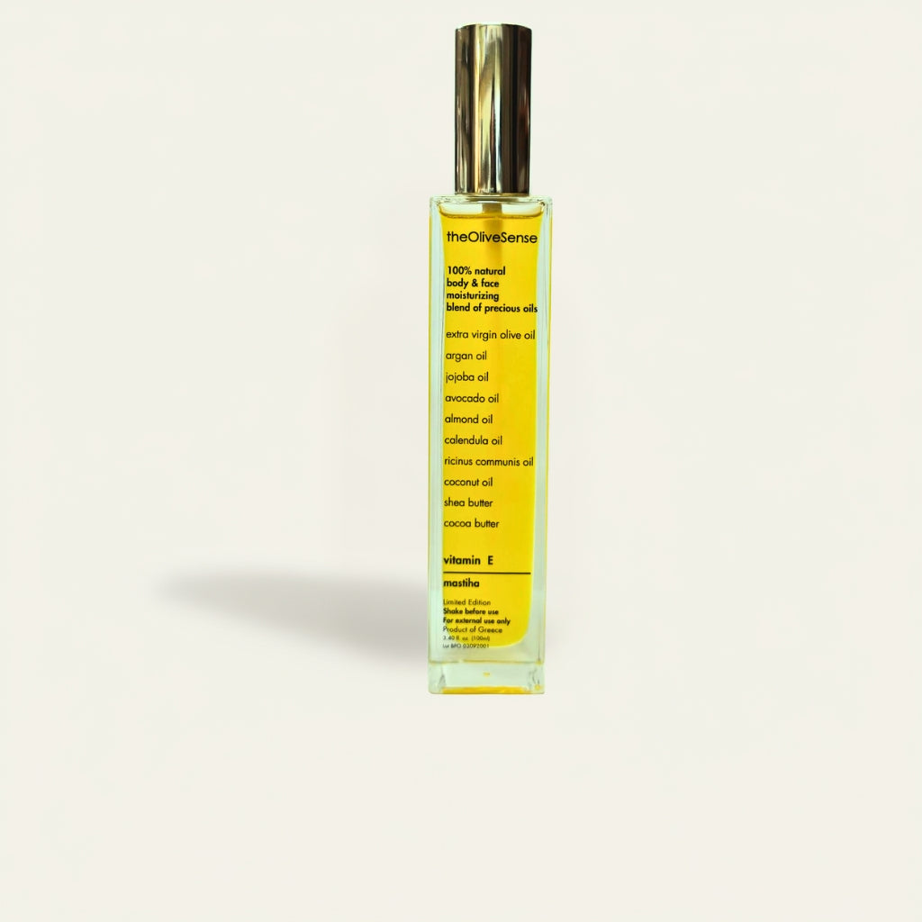 Bottle ofThe Olive Sense body and face oil with vitamin E and fresh mastiha scent.
