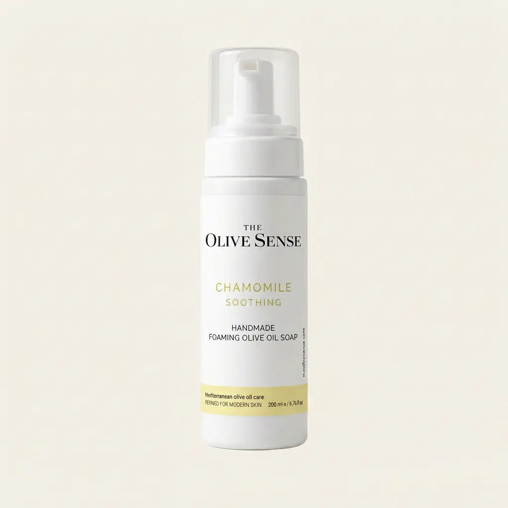 A bottle of The Olive Sense Chamomile Soothing Handmade Foaming Olive Oil 