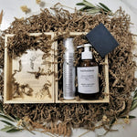 Skincare products in a wooden box with natural elements