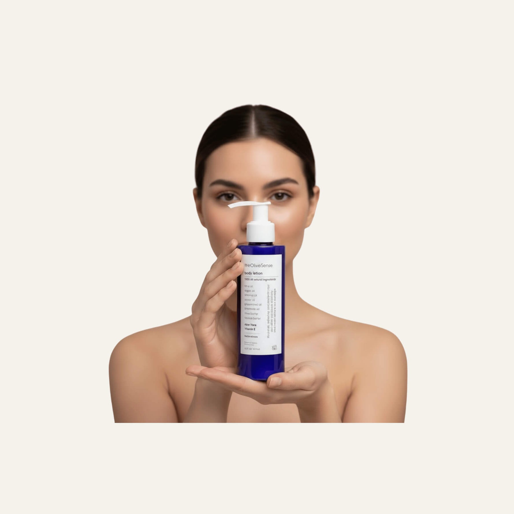 Woman applying a blue skincare product to her face against a beige background